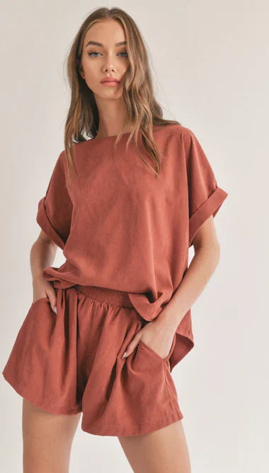 Stylish rust loungewear set from Sophie May Boutique, perfect for cozy winter outfits and lounging in comfort.