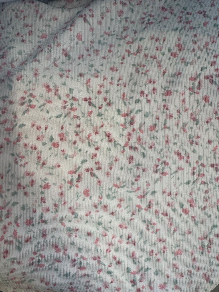 Soft pastel floral fabric pattern, ideal for summer dresses at Sophie May Boutique in Gilbert, AZ.