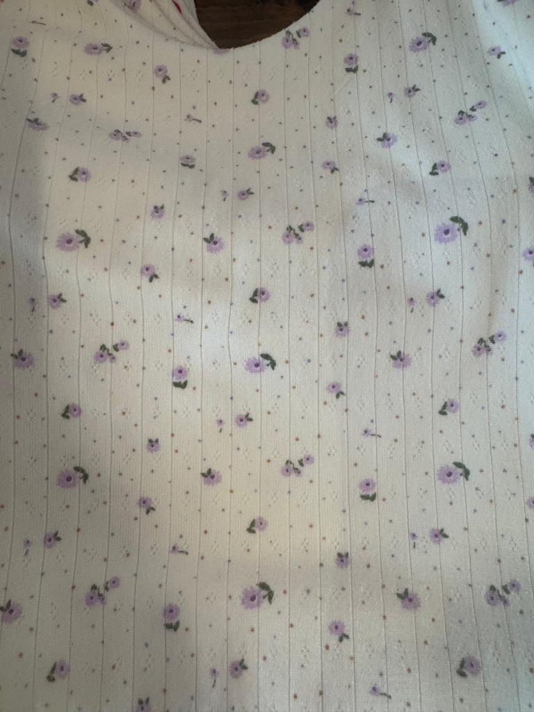 The Picnic Halter featuring delicate purple floral print, perfect for summer outfits from Sophie May Boutique.