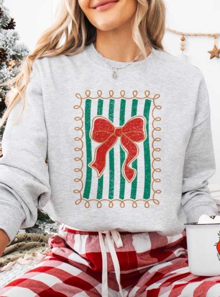 Bow Frame Holiday Crewneck Sweatshirt featuring holiday bow design and vintage stripes, perfect for cozy winter looks.