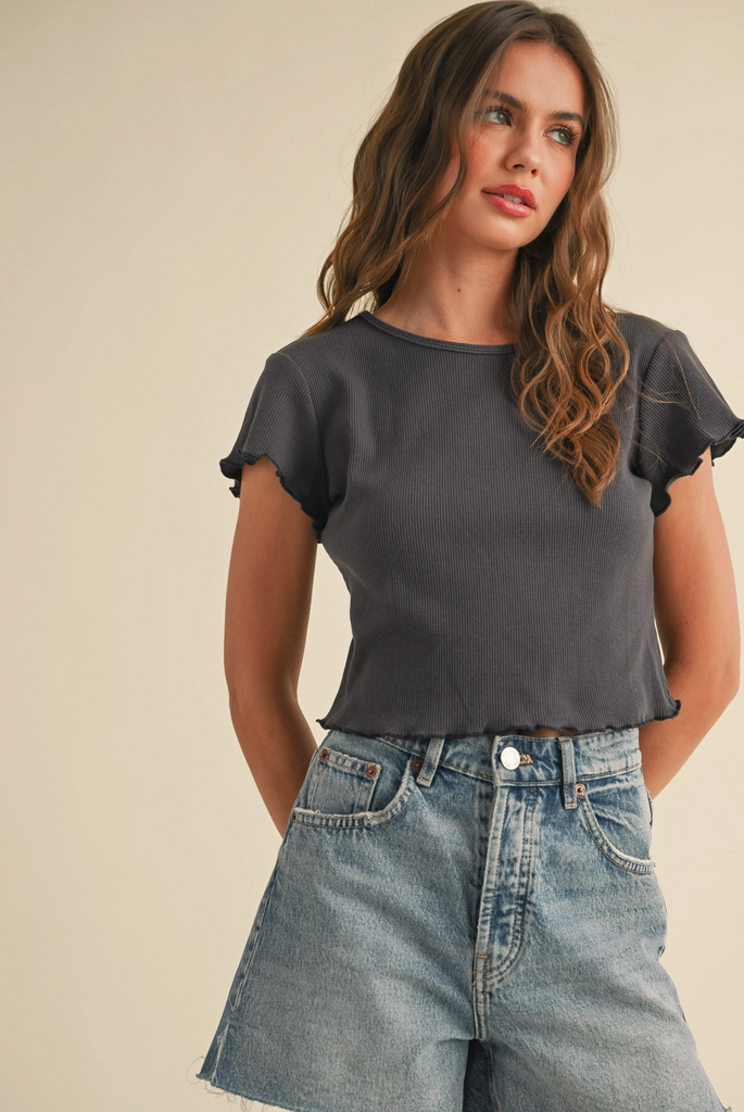 Mini Waffle Short Sleeve Top from Sophie May Boutique, paired with denim shorts for a chic summer look.