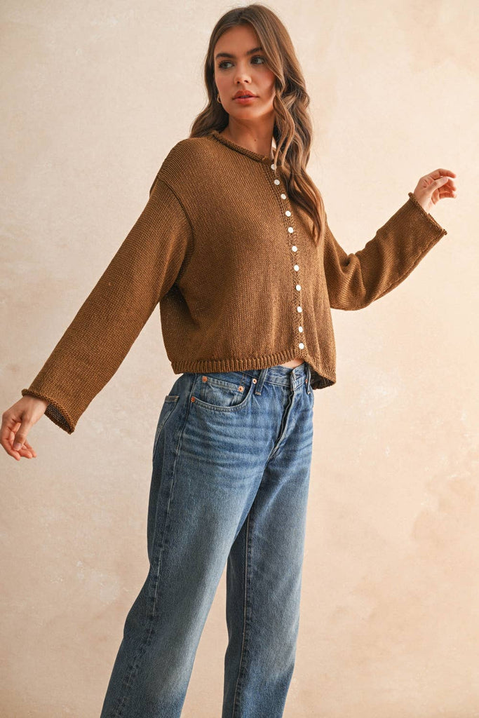 Model wearing a Front Button Cardigan paired with jeans, showcasing women's clothing from an online women’s boutique.